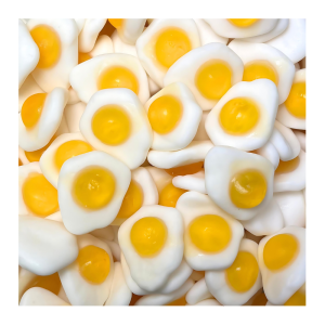 Vrac d'œufs au plat de chez Haribo. Bonbon en forme d'œuf avec le blanc et le jaune