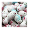 Vrac de tétines mammouth blanche qui sont des sucettes avec une chewing-gum à l'intérieur