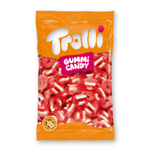 Sachet orange Trolli rempli de dentiers Dracula gélifiés rouge et blanc, texture moelleuse et ludique.